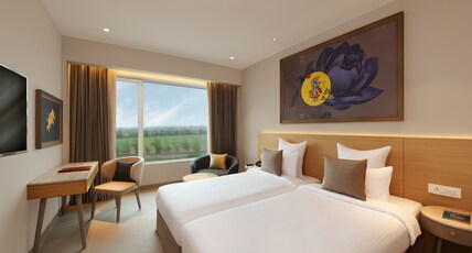 Ginger Dwarka Room Type - D-Luxe Queen Room