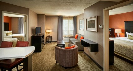 Staybridge Suites HAMILTON - DOWNTOWN, an IHG hotel Room Type - 2 Bedroom Suite Dining Kitchen Single Sofa Bed