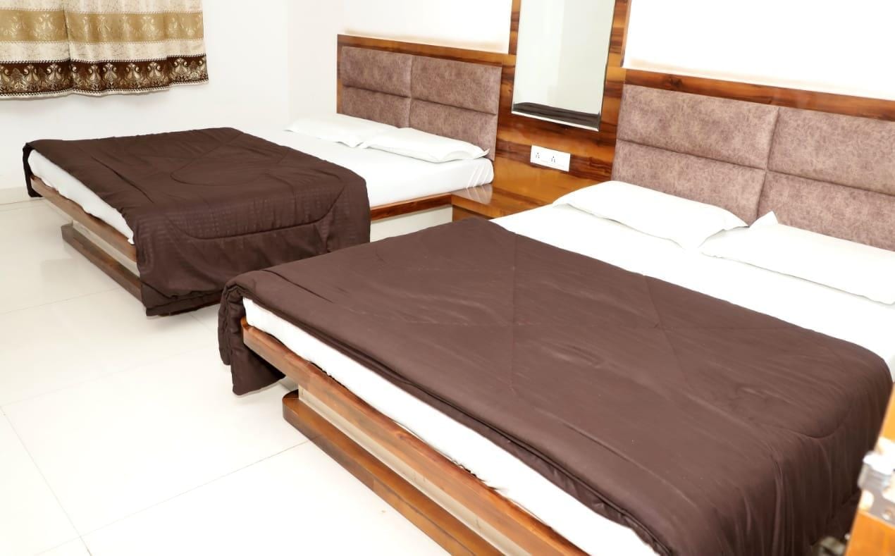 HOTEL MANSAROVAR, OMKARESHWAR - Tap to explore photos