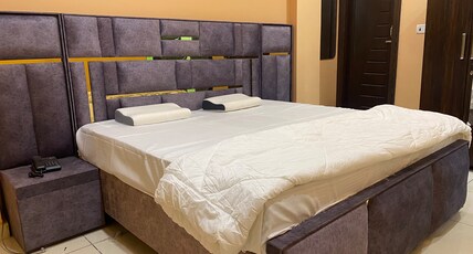 Aahan Inn | Near Kashi Vishwanath Temple Room Type - Deluxe Premium Double Bedroom