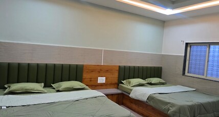 Hotel Ganpati and Lodging Room Type - 4 BED NON AC Deluxe Room