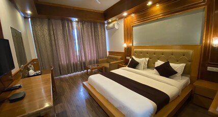 Grace Resort and Spa - A Unit of Divine Paradise Room Type - Super Deluxe Room with Balcony