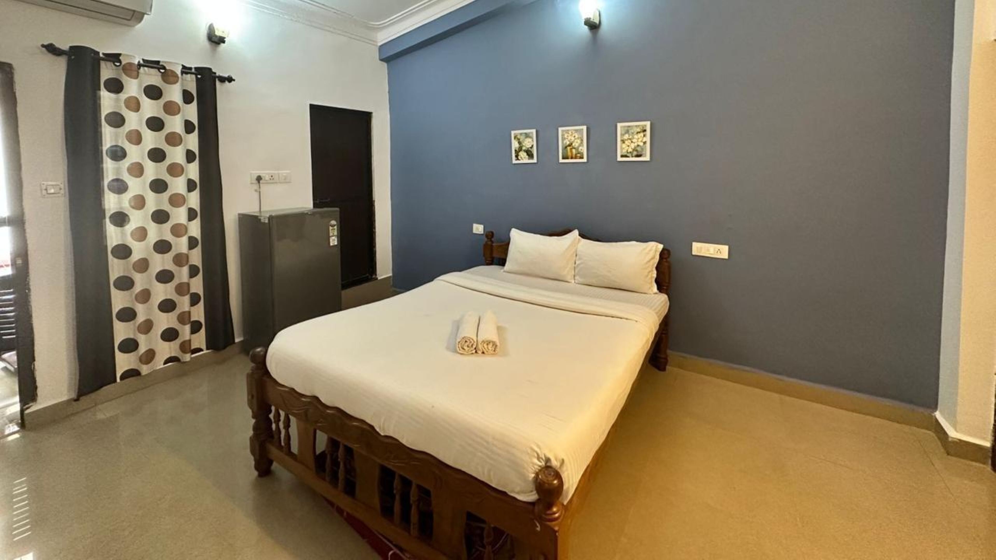 Candolim Beach Inn - Tap to explore photos