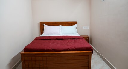 Hill Palace Residency Virajpet Room Type - Deluxe NON AC Room