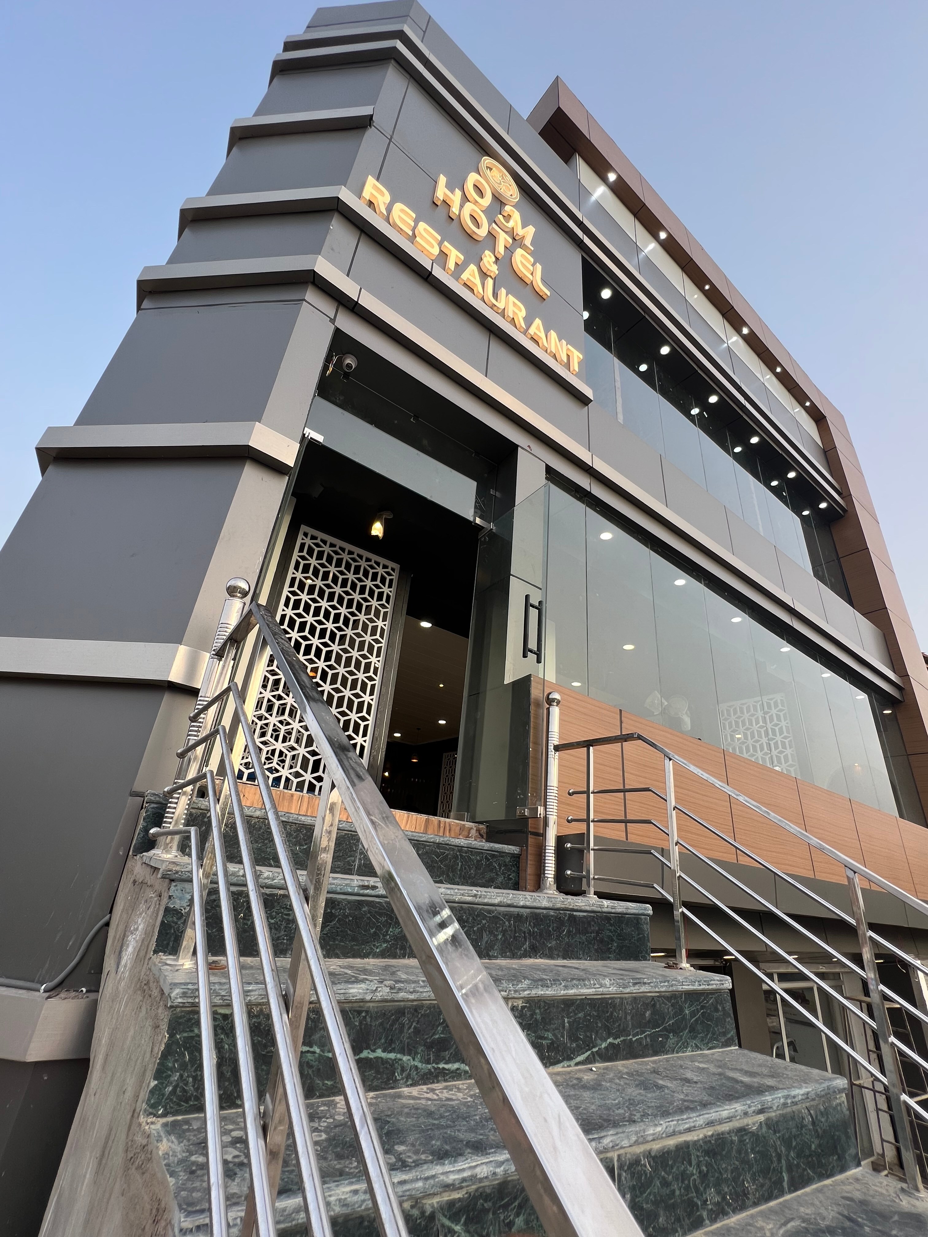 Om Hotel and Restaurants - Tap to explore photos