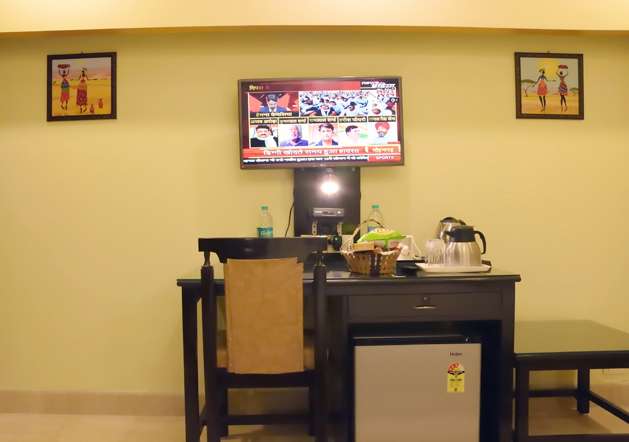 Hotel Sumedha Premium - Tap to explore photos