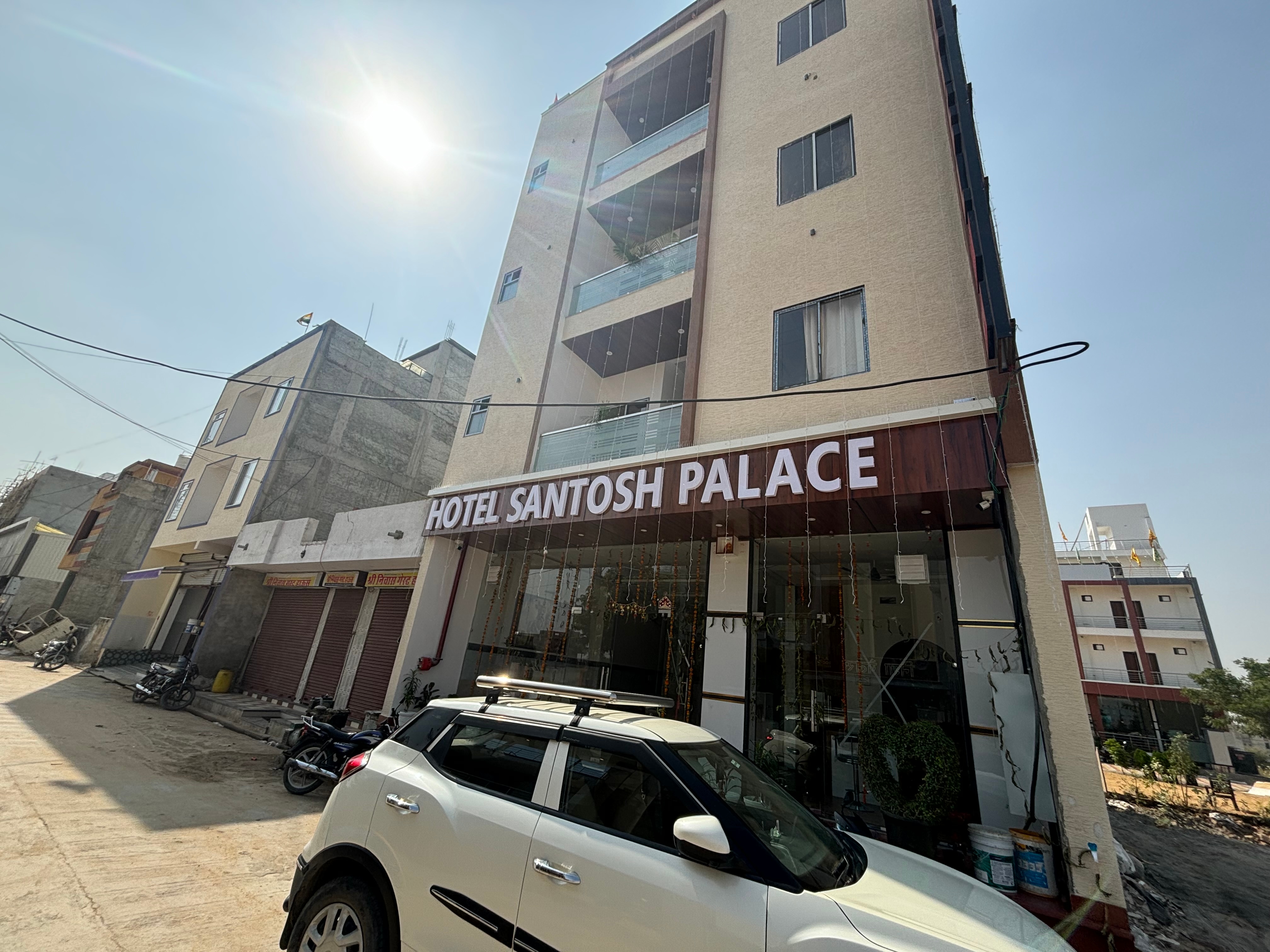 Hotel Santosh Palace (Free Gated Parking & 10 Minutes walk from Temple) - Tap to explore photos