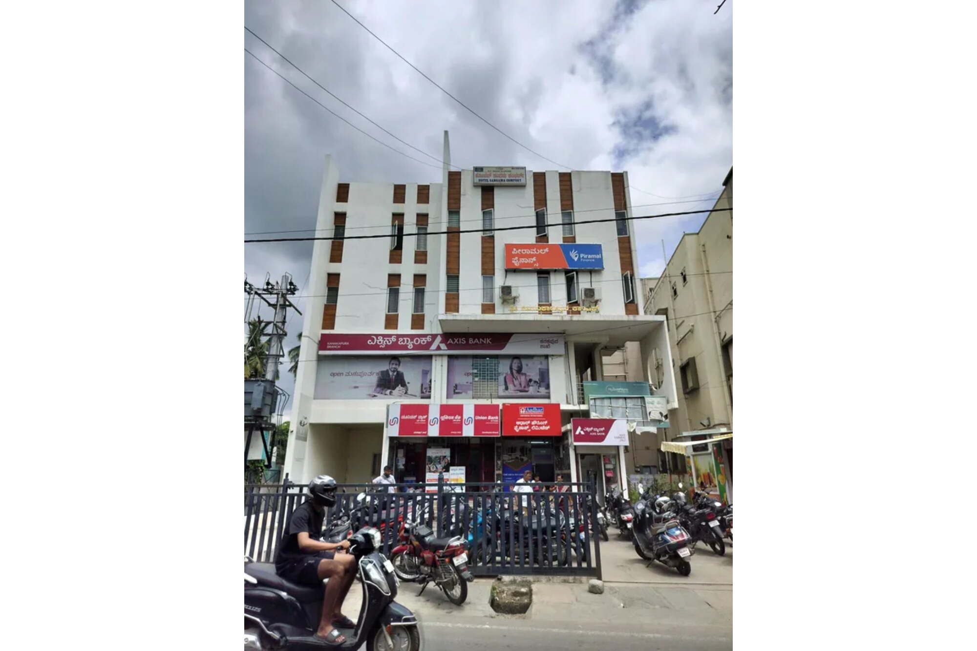 FabHotel Sangama Comfort - Tap to explore photos