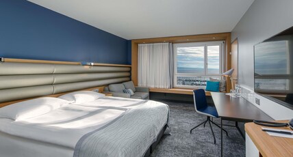 Movenpick Hotel Lausanne Room Type - Deluxe Queen Bed Lake view