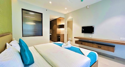 NAKSHATHRA SUITES Room Type - Deluxe Room