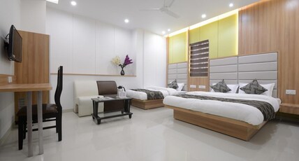 Hotel One Up Room Type - Executive Three bed AC Room