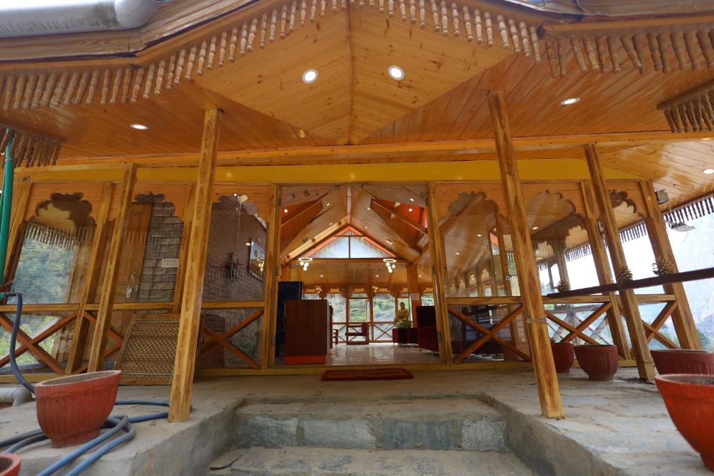 Tirthan Village Resort - Tap to explore photos