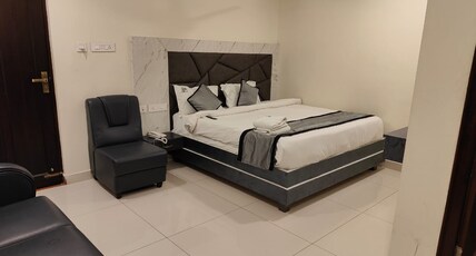 HOTEL PARAMESHWARA LUXURY AWAITS Room Type - Deluxe Double
