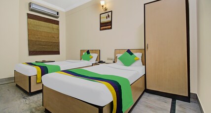 Treebo Maharaja Residency Family Hotel Room Type - Economy Room