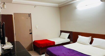 Hotel Rathna Palace Room Type - Mini Family Room AC -3pax One Queen and One Single Bed