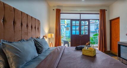 THE BAGA VILLAGE IN BAGA Room Type - Deluxe Room with Balcony