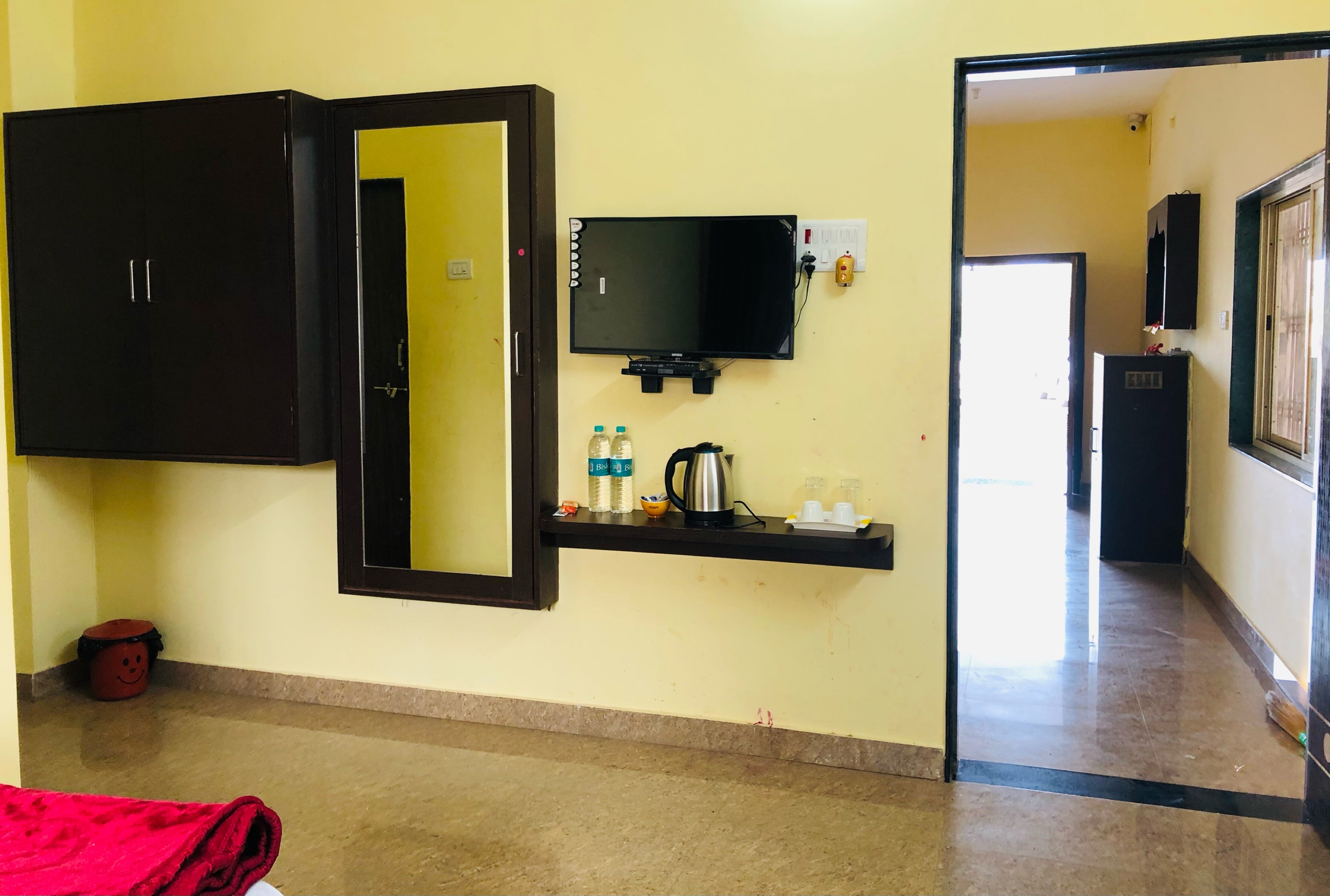 Shrinivas Residency A/c Lodging - Tap to explore photos