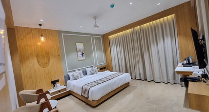 Hotel Aditya Mansingh Inn- Pure Veg Room Type - Deluxe Room