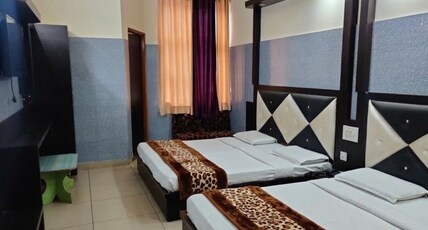 HOTEL AASHIRWAD Room Type - Super Deluxe Four Bed Ac