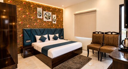 Madhuram Hotel Room Type - Deluxe Room