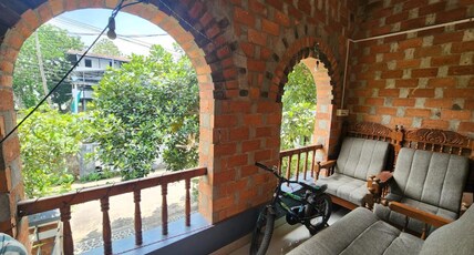 The Brick Nest Room Type - Deluxe King Room with Balcony