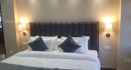 Teak manor is situated at heart of dehradun Room Type - The Deluxe Double Bed Room