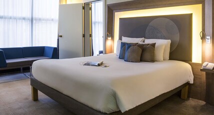 NOVOTEL GENEVE CENTRE - GENEVA Room Type - Superior Suite with a double bed and sofa bed NOVOTEL GENEVE CENTRE - GENEVA Room Type - Superior Suite with a double bed and sofa bed