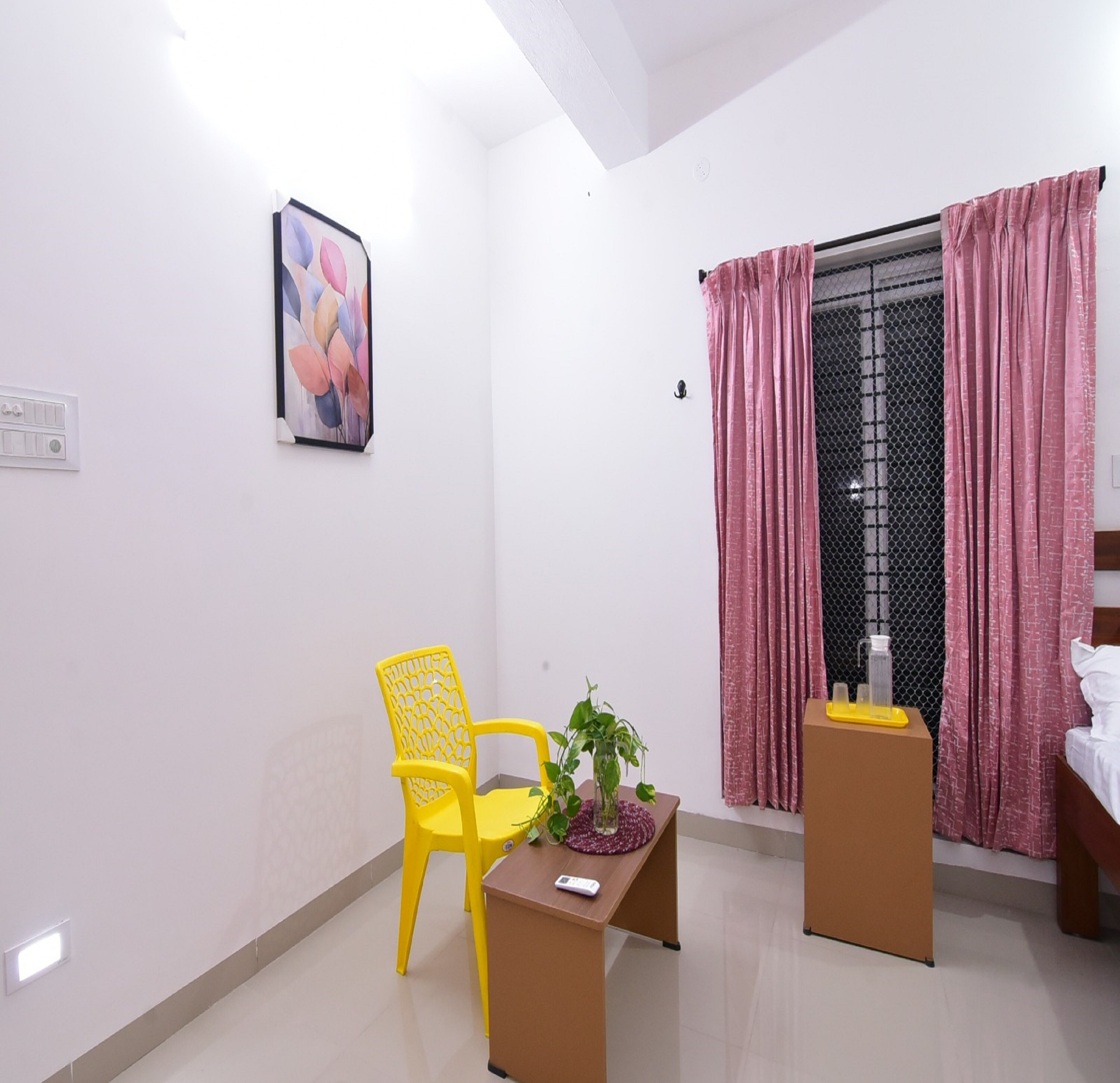 Pondicherry Comfort Rooms - Tap to explore photos
