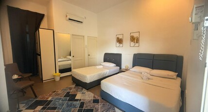 Hotel O HNR INN Room Type - Suite Triple