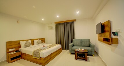 Fly Inn Room Type - Deluxe AC Room