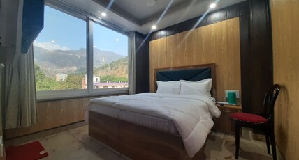 Hotel Laxman Jhula Inn Room Type - DELUXE  1st and 3rd floor