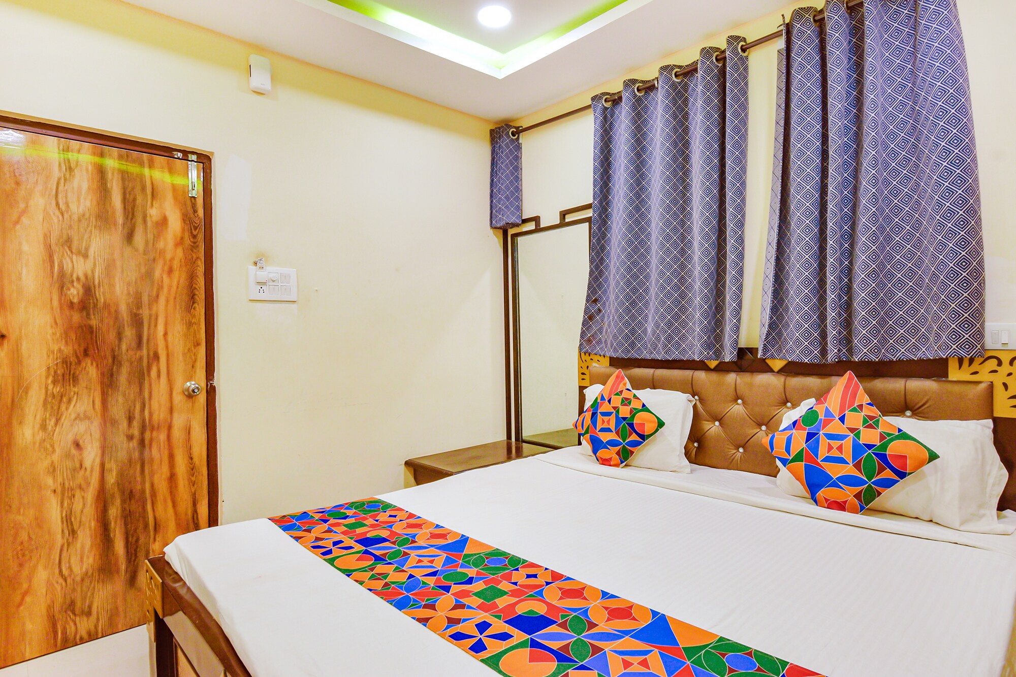 FabHotel Yogeshwara Grand - Tap to explore photos