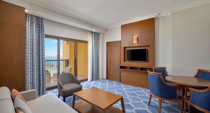 DoubleTree by Hilton Resort  & Spa Marjan Island Room Type - KING ONE BEDROOM SUITE