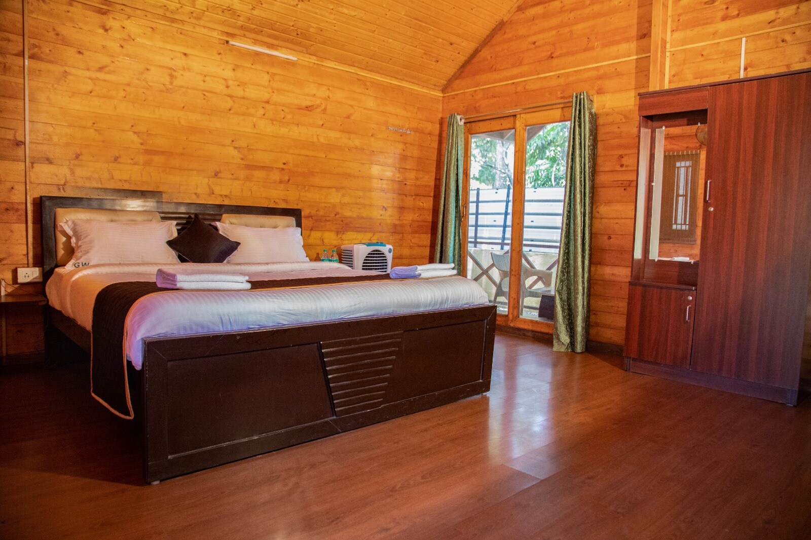 Garden Wood Homestays - Tap to explore photos