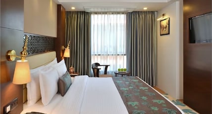 Golden Tulip Srinagar (formerly RK Sarovar Portico Srinagar) Room Type - Deluxe room - 1 Double Bed 21SQM Golden Tulip Srinagar (formerly RK Sarovar Portico Srinagar) Room Type - Deluxe room - 1 Double Bed 21SQM