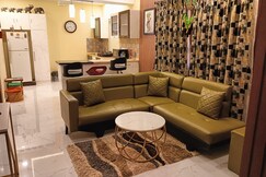 Fuchsia Stays Candolim Apartment