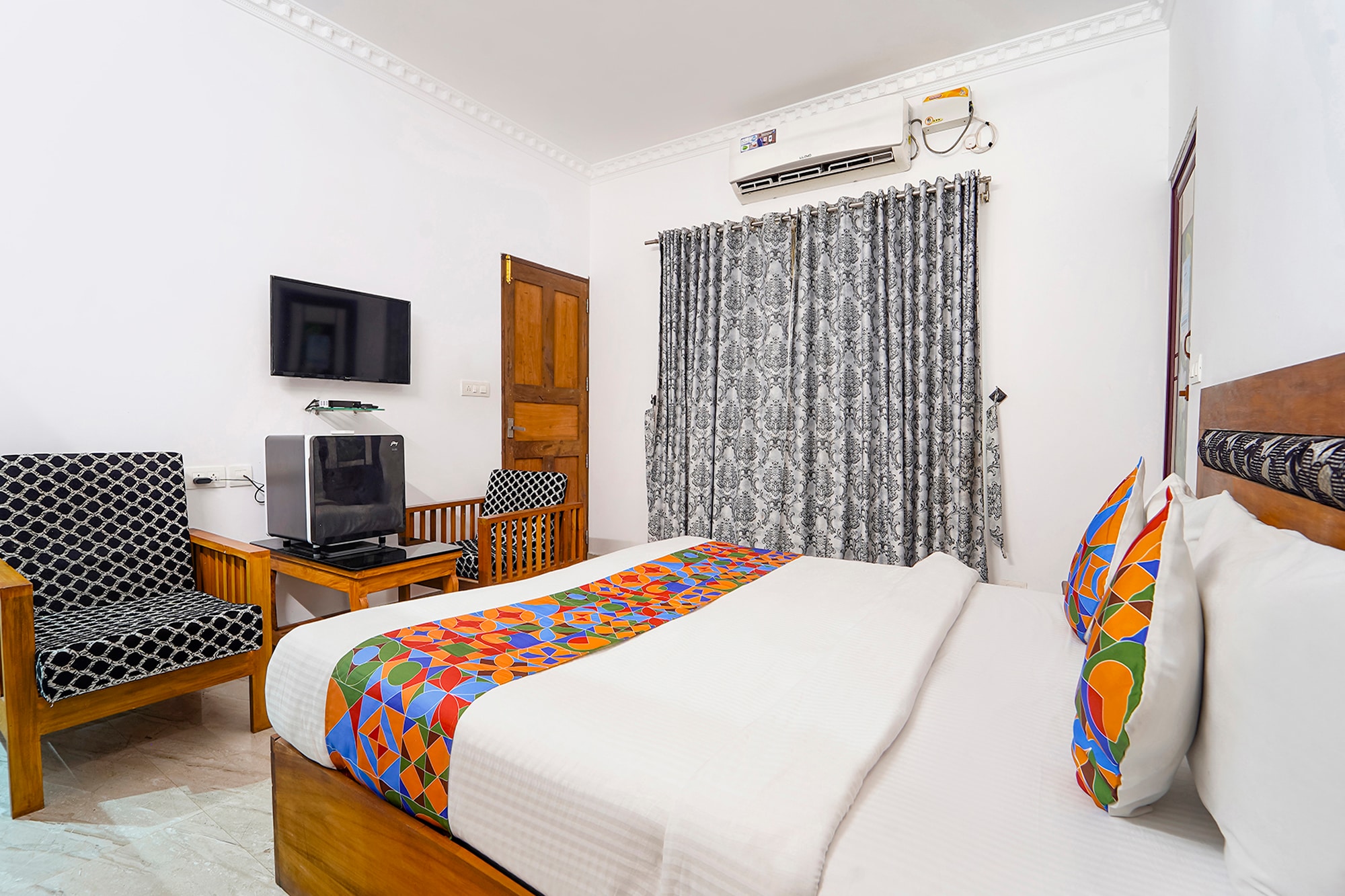 Fabhotel Star Inn Plus - Nr. Kovalam Beach - Tap to explore photos
