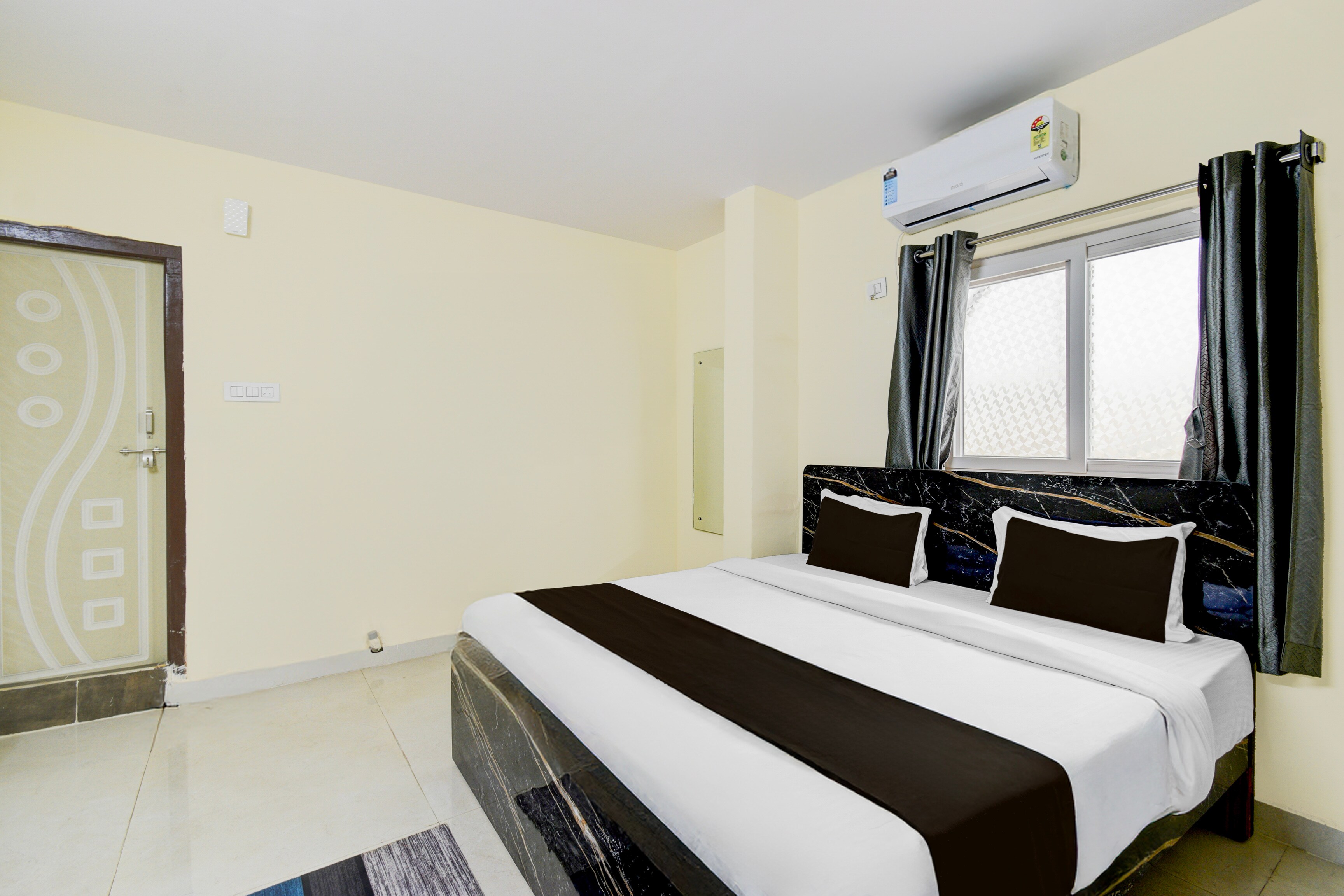 Hotel O RGI Airport Formerly KP Suites - Tap to explore photos