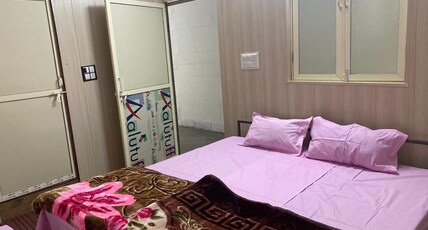 Nityanand Guest House Room Type - Deluxe Room