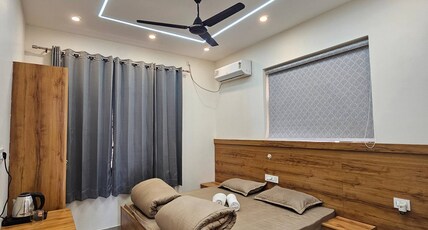 Aarunya Stays Room Type - Super Deluxe with Mountain View 