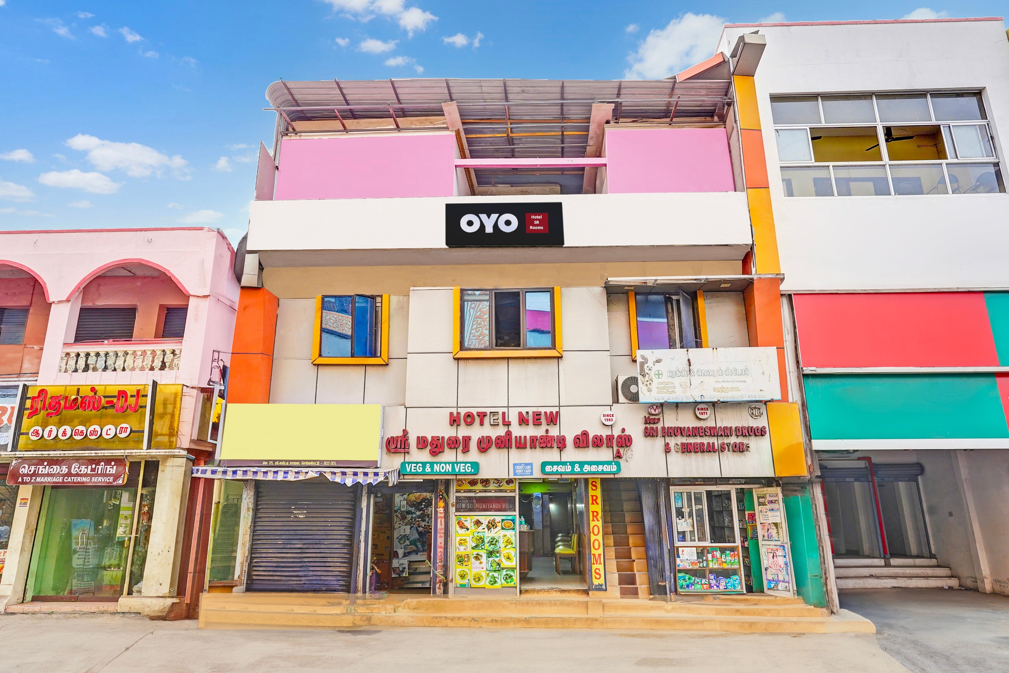 Hotel O SR Rooms - Tap to explore photos