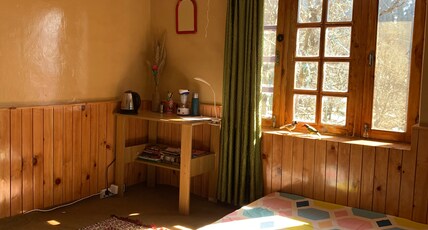 Lost in Woods Homestay Room Type - Sunrise Room