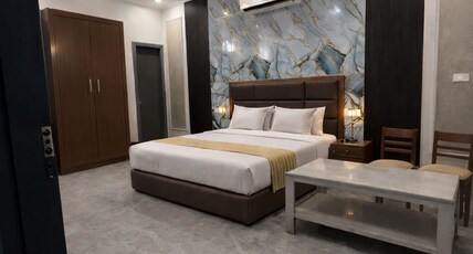 HOTEL NICHOLUS CREST LODGE Room Type - Deluxe Room with Garden View