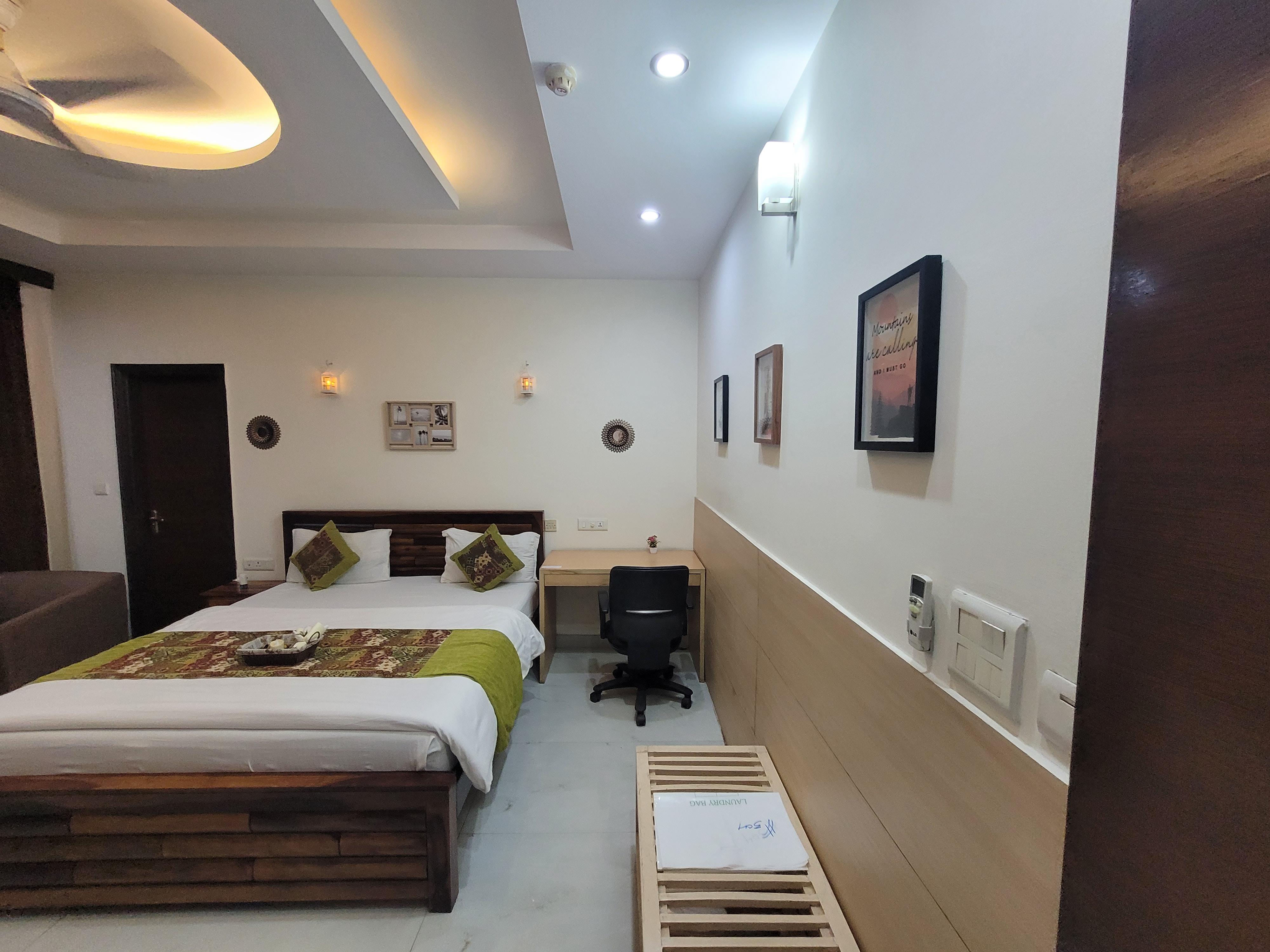Isaki Suites by Ivory Stays - Tap to explore photos