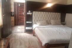 THE ANS DELUXE SUITES AND IN