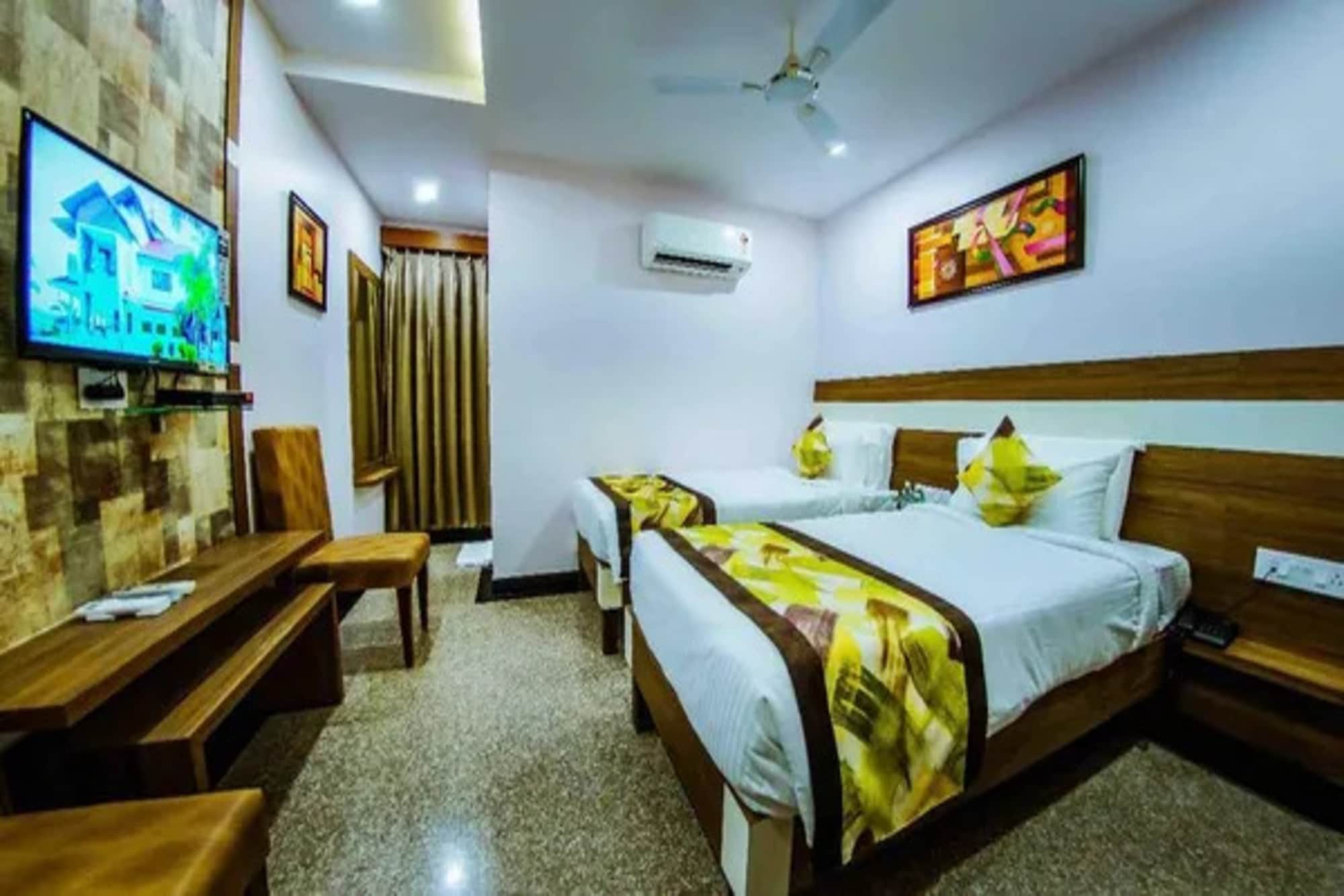 FabHotel Pratibha Grand - Tap to explore photos