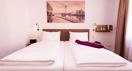 MERCURE DUESSELDORF RATINGEN Room Type - Comfort room with double bed or 2 single beds
