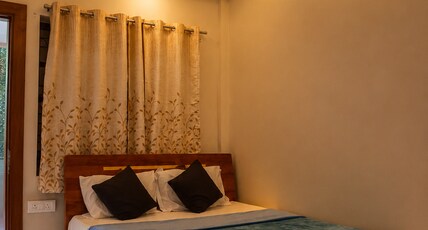 Thaanya Guest Rooms Room Type - Deluxe room with AC