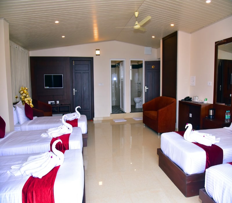 HOTEL COORG PALACE INN - Tap to explore photos