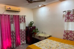 Eastern Bedroom with separate refrigerator